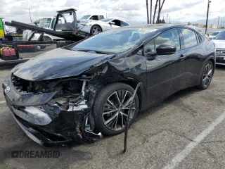 2023 Toyota Prius LE z VIN JTDACAAUXP3005928, wystawiony jako Copart lot #56358905 z przebiegiem 38 417 mil mil oraz Szkoda całkowita • Salvage title. Historia ofert i sprzedaży dostępna na DreamBid. Obrazek 1.