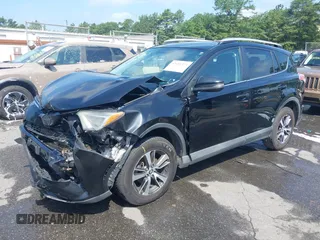 2016 Toyota RAV4 XLE with VIN 2T3RFREV9GW458057, listed as a IAAI auction lot 42651373 with 119,750 mi miles and . Bid and sale history available at DreamBid. Image 18.