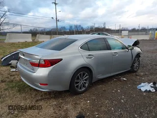 2016 Lexus ES 300h z VIN JTHBW1GGXG2109451, wystawiony jako IAAI lot #41168128 z przebiegiem 101 603 mil mil oraz . Historia ofert i sprzedaży dostępna na DreamBid. Obrazek 4.