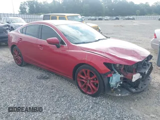 2014 Mazda 6 i Grand Touring с VIN JM1GJ1W6XE1152303, выставлен на аукционе IAAI как лот 42425056 с пробегом 127 351 миль миль и . История ставок и продаж доступна на DreamBid. Изображение 1.