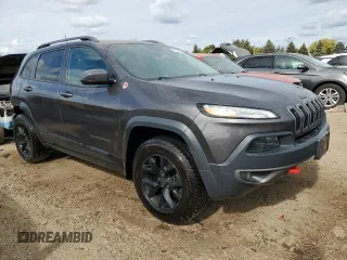 2018 Jeep Cherokee Trailhawk with VIN 1C4PJMBB2JD506327, listed as a Copart auction lot 75747364 with 186,413 mi miles and Salvage Title. Bid and sale history available at DreamBid. Image 4.