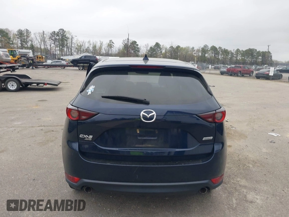 2017 Mazda CX-5 Touring with VIN JM3KFBCL9H0163449, listed as a IAAI auction lot 41919020 with 102,898 mi miles. Bid and sale history available at carsss.com. Image 16.