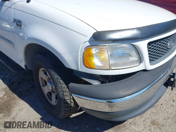 2001 Ford F-150 XL z VIN 1FTRF17W61NB22632, wystawiony jako IAAI lot #41824156 z przebiegiem Nie podano mil oraz . Historia ofert i sprzedaży dostępna na DreamBid. Obrazek 18.