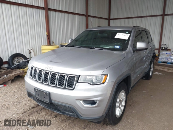 2018 Jeep Grand Cherokee Laredo E with VIN 1C4RJEAG1JC275356, listed as a IAAI auction lot 42150422 with 69,720 mi miles and . Bid and sale history available at DreamBid. Image 17.