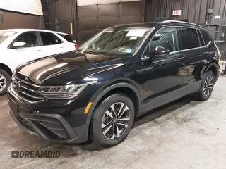 2024 Volkswagen Tiguan S with VIN 3VVFB7AX2RM134769, listed as a IAAI auction lot 42462792 with 1,733 mi miles and . Bid and sale history available at DreamBid. Image 2.