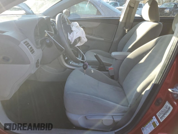 2010 Toyota Corolla z VIN 1NXBU4EE0AZ289475, wystawiony jako Copart lot #43056795 z przebiegiem 183 995 mil mil oraz Szkoda całkowita • Salvage title. Historia ofert i sprzedaży dostępna na DreamBid. Obrazek 7.