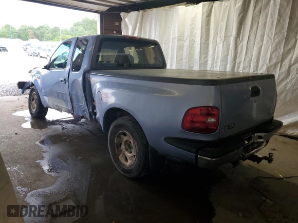 1997 Ford F-150 with VIN 1FTDX076XVKC72073, listed as a Copart auction lot 62774955 with 204,105 mi miles and Salvage title. Bid and sale history available at DreamBid. Image 2.