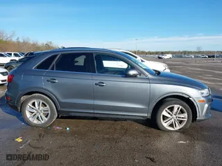 2016 Audi Q3 Premium Plus with VIN WA1BFCFSXGR014778, listed as a IAAI auction lot 41285863 with 73,044 mi miles. Bid and sale history available at carsss.com. Image 13.