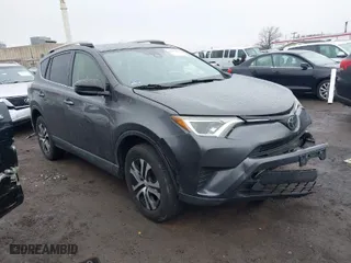 2018 Toyota RAV4 LE with VIN JTMBFREV0JJ223957, listed as a IAAI auction lot 41652810 with 144,629 mi miles. Bid and sale history available at carsss.com. Image 1.