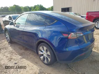 2022 Tesla Model Y Long Range z VIN 7SAYGDEE0NF429399, wystawiony jako IAAI lot #42333630 z przebiegiem 32 937 mil mil oraz . Historia ofert i sprzedaży dostępna na DreamBid. Obrazek 3.