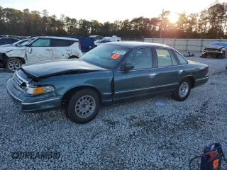 1996 Ford Crown Victoria LX с VIN 2FALP74W0TX205507, выставлен на аукционе Copart как лот 85310874 с пробегом 51 646 миль миль и Списание • Salvage title. История ставок и продаж доступна на DreamBid. Изображение 1.