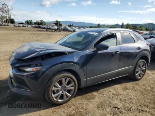 2022 Mazda CX-30 S Select z VIN 3MVDMBBL6NM444186, wystawiony jako Copart lot #54880125 z przebiegiem 26 132 mil mil oraz Szkoda całkowita • Salvage title. Historia ofert i sprzedaży dostępna na DreamBid. Obrazek 1.