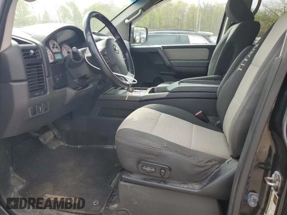 2012 Nissan Titan SV with VIN 1N6AA0EJ2CN311162, listed as a Copart auction lot 54403125 with 233,662 mi miles and Salvage title. Bid and sale history available at DreamBid. Image 7.