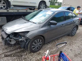 2012 Ford Focus SE with VIN 1FAHP3F29CL310052, listed as a IAAI auction lot 42671578 with 220,537 mi miles and . Bid and sale history available at DreamBid. Image 2.
