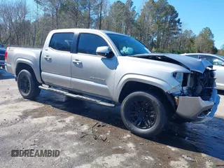 2016 Toyota Tacoma SR5 z VIN 5TFAZ5CN0GX015890, wystawiony jako IAAI lot #41636666 z przebiegiem 103 569 mil mil oraz . Historia ofert i sprzedaży dostępna na DreamBid. Obrazek 1.