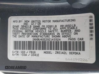 2009 Toyota Corolla with VIN 1NXBU40E29Z143324, listed as a IAAI auction lot 42101208 with 237,763 mi miles. Bid and sale history available at carsss.com. Image 9.