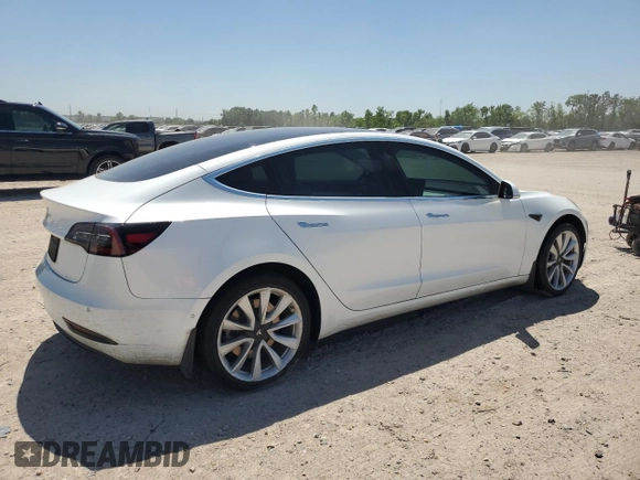 2020 Tesla Model 3 Standard Range Plus with VIN 5YJ3E1EA5LF599280, listed as a Copart auction lot 52383295 with 58,506 mi miles and Salvage Title. Bid and sale history available at DreamBid. Image 3.