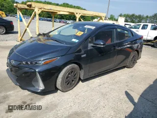 2021 Toyota Prius LE with VIN JTDKAMFP2M3187392, listed as a Copart auction lot 60474205 with 114,711 mi miles and Salvage title. Bid and sale history available at DreamBid. Image 1.