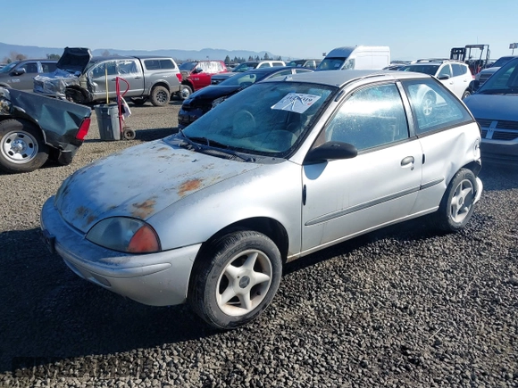 1999 Suzuki Swift z VIN 2S2AB21H9X6600313, wystawiony jako IAAI lot #41430319 z przebiegiem 149 795 mil mil oraz . Historia ofert i sprzedaży dostępna na DreamBid. Obrazek 2.