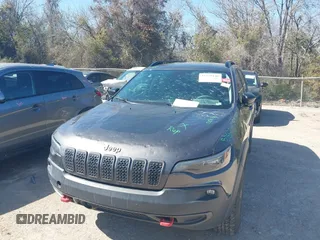 2022 Jeep Cherokee Trailhawk with VIN 1C4PJMBX4ND535037, listed as a IAAI auction lot 41779140 with 49,733 mi miles. Bid and sale history available at carsss.com. Image 6.