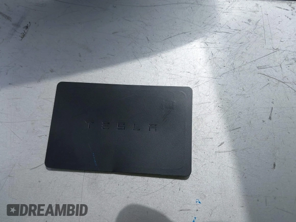 2020 Tesla Model 3 Standard Range Plus z VIN 5YJ3E1EA8LF785010, wystawiony jako IAAI lot #42130951 z przebiegiem 90 072 mil mil oraz . Historia ofert i sprzedaży dostępna na DreamBid. Obrazek 11.