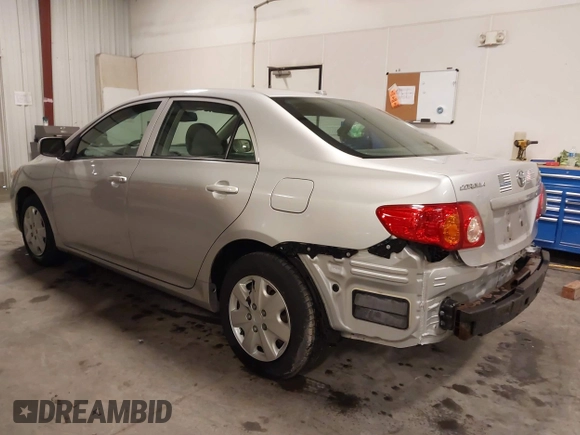 2009 Toyota Corolla with VIN 1NXBU40E69Z129314, listed as a IAAI auction lot 41718098 with 170,739 mi miles. Bid and sale history available at carsss.com. Image 3.