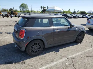 2014 MINI Hardtop with VIN WMWXM5C57ET934120, listed as a Copart auction lot 58594845 with 115,248 mi miles and Salvage title. Bid and sale history available at DreamBid. Image 3.