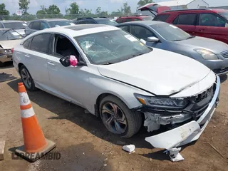 2020 Honda Accord EX with VIN 1HGCV1F48LA114164, listed as a IAAI auction lot 42600450 with 82,857 mi miles and . Bid and sale history available at DreamBid. Image 1.