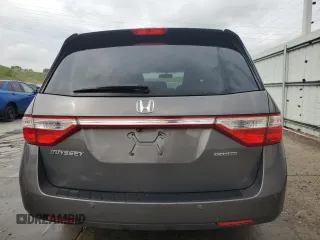 2012 Honda Odyssey Touring with VIN 5FNRL5H94CB109257, listed as a Copart auction lot 59636075 with 107,543 mi miles and Salvage title. Bid and sale history available at DreamBid. Image 6.