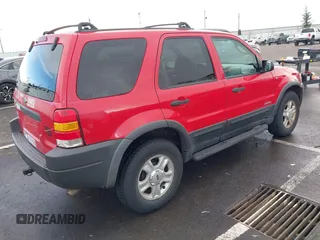 2002 Ford Escape XLT Choice with VIN 1FMCU04122KD84869, listed as a IAAI auction lot 41797569 with 181,346 mi miles. Bid and sale history available at carsss.com. Image 4.