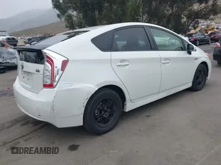 2015 Toyota Prius Four with VIN JTDKN3DU7F0426088, listed as a IAAI auction lot 42157924 with 109,746 mi miles and . Bid and sale history available at DreamBid. Image 4.