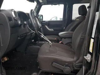 2015 Jeep Wrangler Unlimited Sahara with VIN 1C4BJWEGXFL606573, listed as a Copart auction lot 83983894 with 103,314 mi miles and Clean title. Bid and sale history available at DreamBid. Image 7.