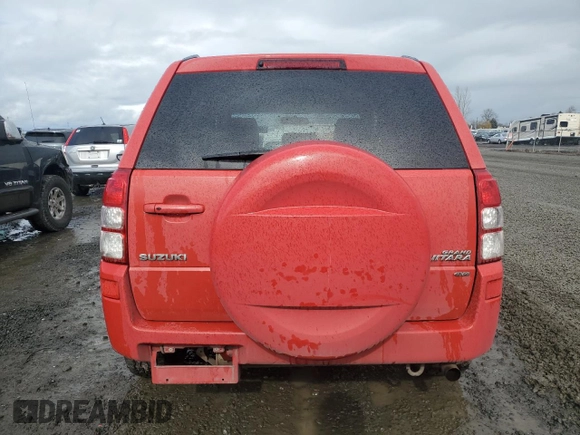 2008 Suzuki Grand Vitara Luxury z VIN JS3TD947084100425, wystawiony jako Copart lot #44932925 z przebiegiem 181 473 mil mil oraz Szkody całkowita. Historia ofert i sprzedaży dostępna na DreamBid. Obrazek 6.