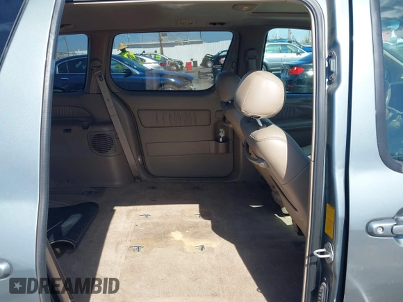 1999 Toyota Sienna LE with VIN 4T3ZF13C5XU099020, listed as a IAAI auction lot 41709287 with 206,884 mi miles. Bid and sale history available at carsss.com. Image 8.