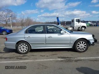 2003 Hyundai Sonata GLS with VIN KMHWF35H23A909117, listed as a IAAI auction lot 41535679 with 149,285 mi miles. Bid and sale history available at carsss.com. Image 14.