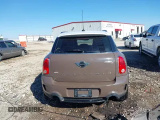 2014 MINI Countryman S with VIN WMWZC3C5XEWP52054, listed as a IAAI auction lot 41452354 with 104,873 mi miles and . Bid and sale history available at DreamBid. Image 17.