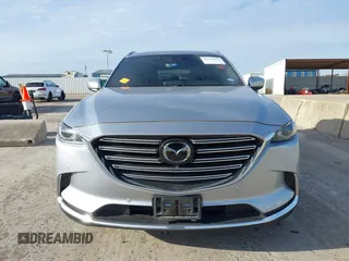 2020 Mazda CX-9 Grand Touring z VIN JM3TCADY7L0416696, wystawiony jako IAAI lot #41310183 z przebiegiem 105 754 mil mil oraz . Historia ofert i sprzedaży dostępna na DreamBid. Obrazek 12.