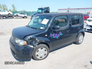 2011 Nissan Cube S z VIN JN8AZ2KR5BT208415, wystawiony jako IAAI lot #40266234 z przebiegiem 110 543 mil mil oraz . Historia ofert i sprzedaży dostępna na DreamBid. Obrazek 2.