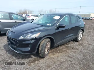 2020 Ford Escape SE with VIN 1FMCU0G67LUB94143, listed as a IAAI auction lot 42033681 with 34,180 mi miles and . Bid and sale history available at carsss.com. Image 2.