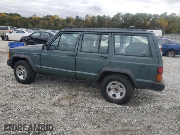 1993 Jeep Cherokee Sport with VIN 1J4FT68S4PL588241, listed as a Copart auction lot 80115884 with 204,174 mi miles and Salvage Title. Bid and sale history available at carsss.com. Image 2.