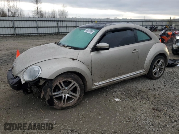 2013 Volkswagen Beetle 2.5L w/Sun with VIN 3VWJP7AT2DM673129, listed as a Copart auction lot 43284955 with 145,864 mi miles and Salvage title. Bid and sale history available at DreamBid. Image 1.