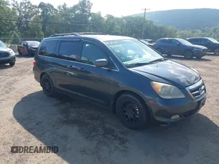 2005 Honda Odyssey EX-L with VIN 5FNRL38775B127158, listed as a IAAI auction lot 42760916 with 275,795 mi miles and . Bid and sale history available at DreamBid. Image 1.