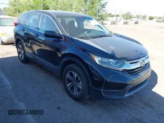 2018 Honda CR-V LX z VIN 2HKRW6H3XJH215476, wystawiony jako IAAI lot #42263417 z przebiegiem 64 556 mil mil oraz . Historia ofert i sprzedaży dostępna na DreamBid. Obrazek 1.