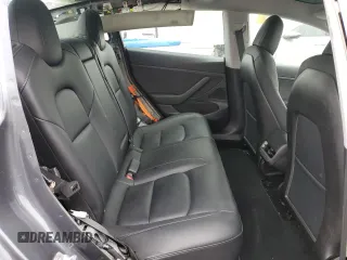 2020 Tesla Model 3 Standard Range Plus z VIN 5YJ3E1EA2LF704941, wystawiony jako Copart lot #58938485 z przebiegiem 34 851 mil mil oraz Szkoda całkowita • Salvage title. Historia ofert i sprzedaży dostępna na DreamBid. Obrazek 10.