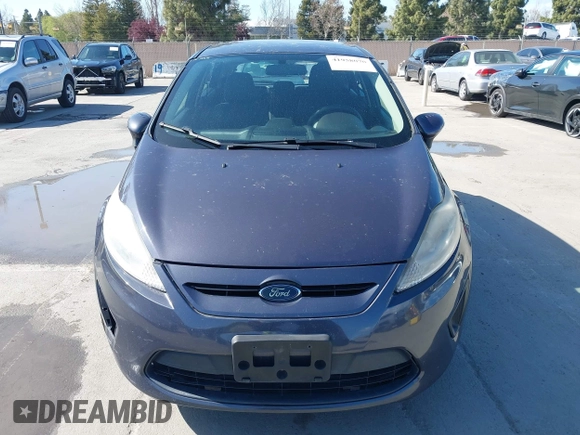 2013 Ford Fiesta SE with VIN 3FADP4EJ8DM221179, listed as a IAAI auction lot 41958070 with 197,454 mi miles. Bid and sale history available at carsss.com. Image 6.