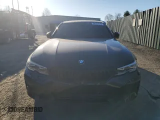 2020 BMW 3 Series 330i xDrive with VIN 3MW5R7J04L8B23519, listed as a Copart auction lot 50749415 with 103,324 mi miles and Salvage Title. Bid and sale history available at carsss.com. Image 5.