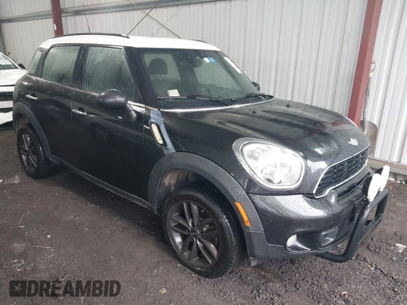 2014 MINI Countryman S with VIN WMWZC5C53EWP40677, listed as a IAAI auction lot 41473281 with 108,616 mi miles and . Bid and sale history available at DreamBid. Image 1.
