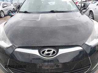 2013 Hyundai Veloster w/Black Int z VIN KMHTC6AD7DU152800, wystawiony jako IAAI lot #42477655 z przebiegiem 93 169 mil mil oraz . Historia ofert i sprzedaży dostępna na DreamBid. Obrazek 6.
