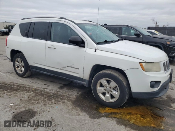 2013 Jeep Compass Sport with VIN 1C4NJCBA4DD115709, listed as a Copart auction lot 88408875 with 241,259 mi miles and Salvage Title. Bid and sale history available at carsss.com. Image 4.
