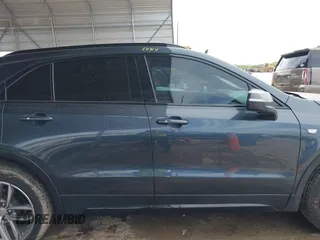2019 Cadillac XT4 FWD Sport z VIN 1GYFZER49KF215843, wystawiony jako IAAI lot #41912861 z przebiegiem 102 922 mil mil oraz . Historia ofert i sprzedaży dostępna na DreamBid. Obrazek 13.